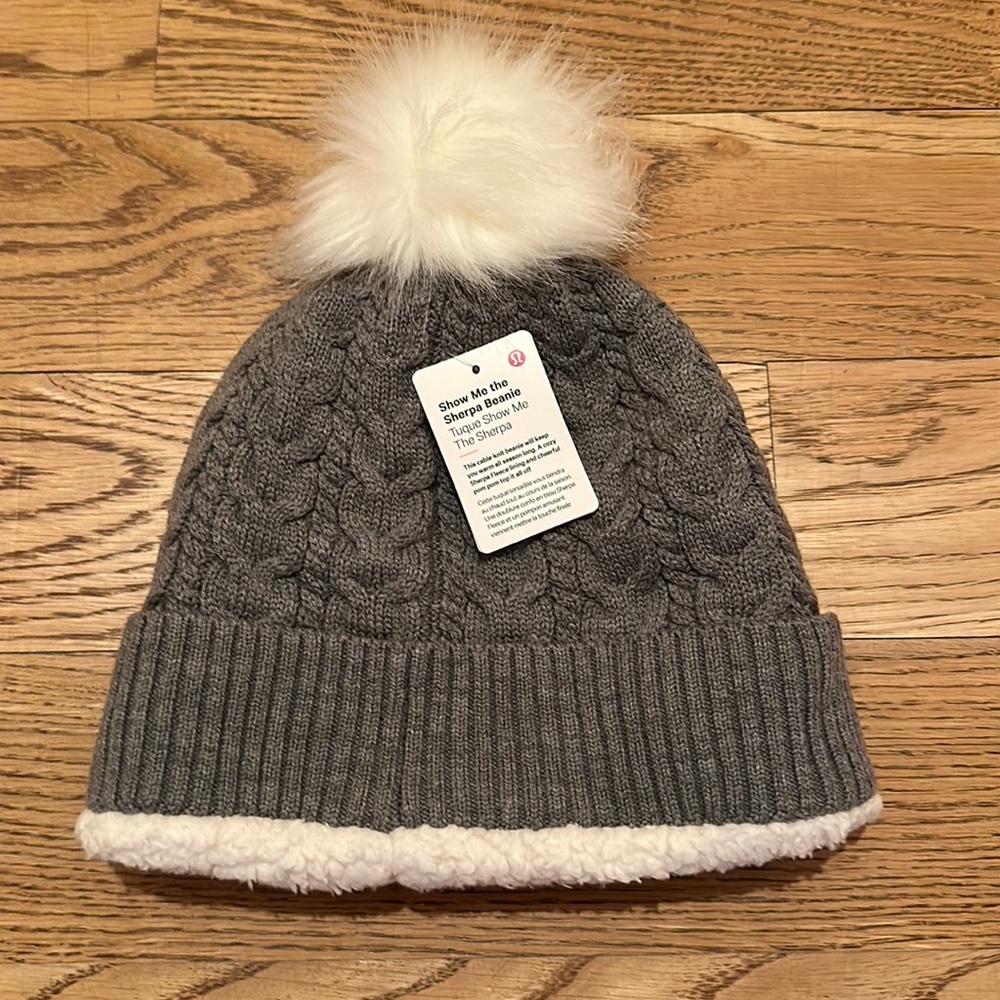 NWOT. Women’s Lululemon show me the Sherpa Beanie. I’m grey & White.